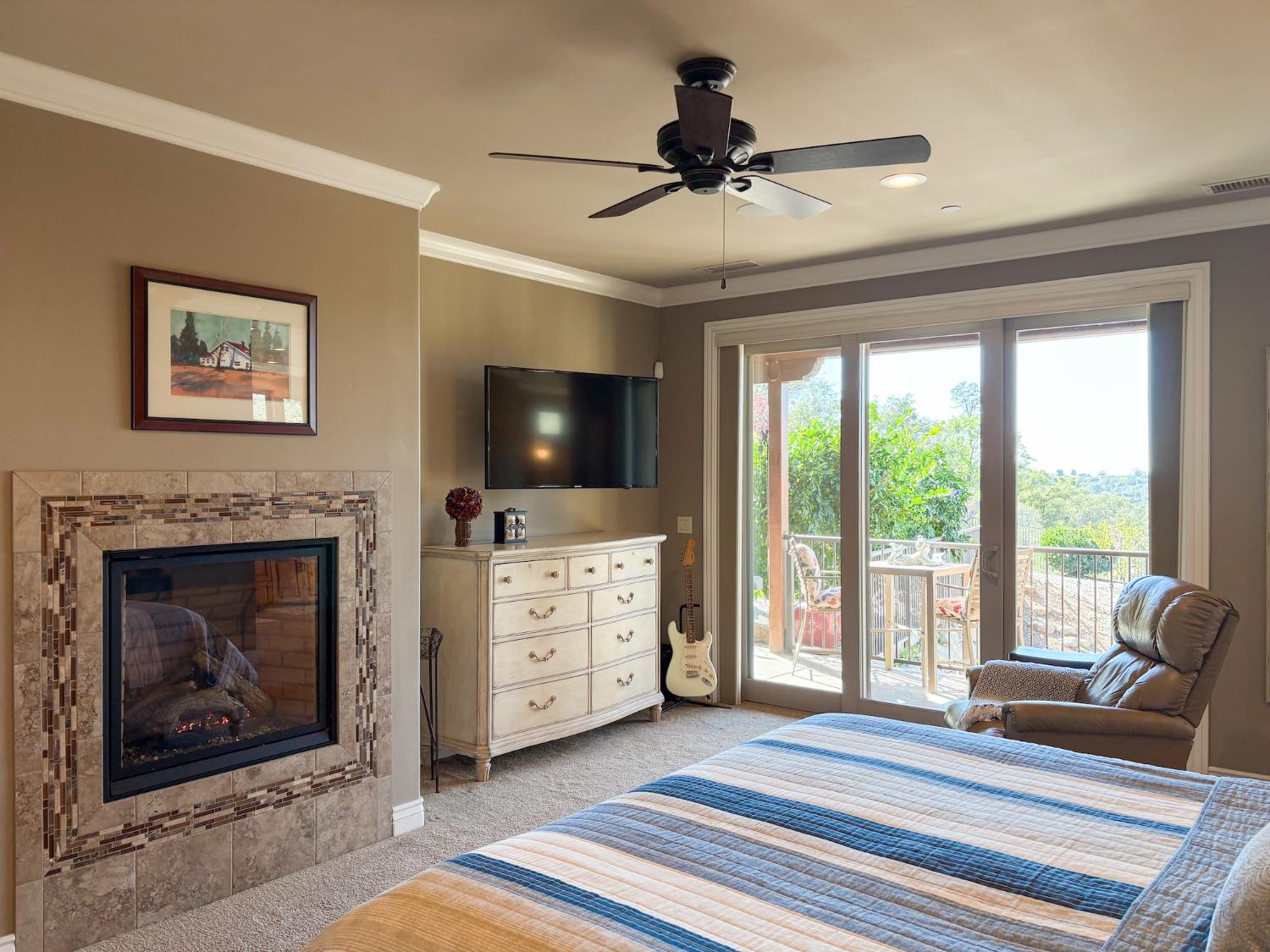 2920 Martel Creek Road Rescue, CA 95672 - Photo 23 of 69 a living room with furniture and a flat screen tv