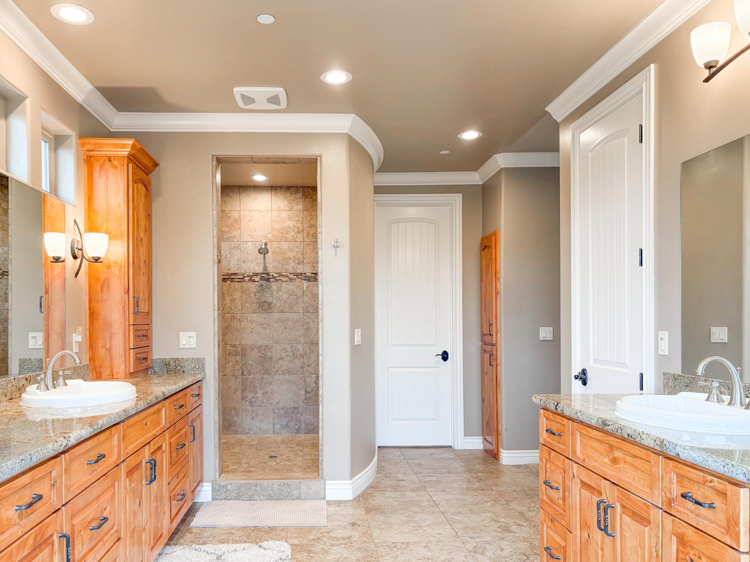 2920 Martel Creek Road Rescue, CA 95672 - Photo 28 of 69 a bathroom with a granite countertop sink mirror bathtub and shower