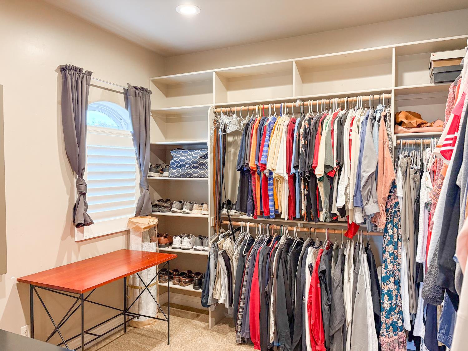 2920 Martel Creek Road Rescue, CA 95672 - Photo 31 of 69 a view of walk in closet with clothes and shoes