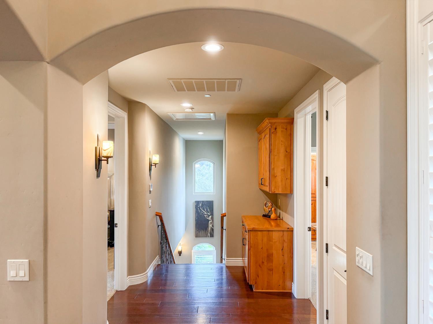 2920 Martel Creek Road Rescue, CA 95672 - Photo 32 of 69 a view of a hallway with wooden floor and stairs