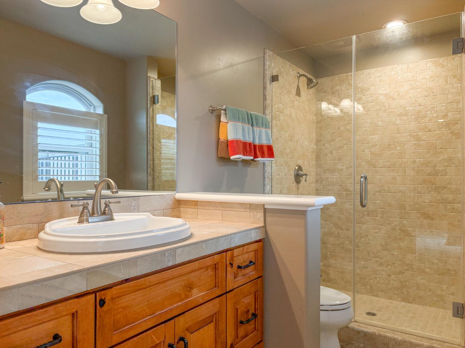 2920 Martel Creek Road Rescue, CA 95672 - Photo 40 of 69 a bathroom with a sink a toilet and shower