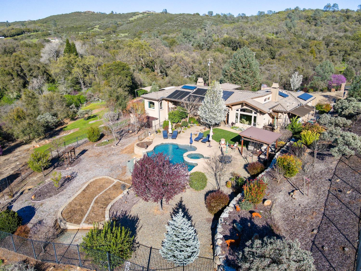 2920 Martel Creek Road Rescue, CA 95672 - Photo 44 of 69 an aerial view of a house with a mountain