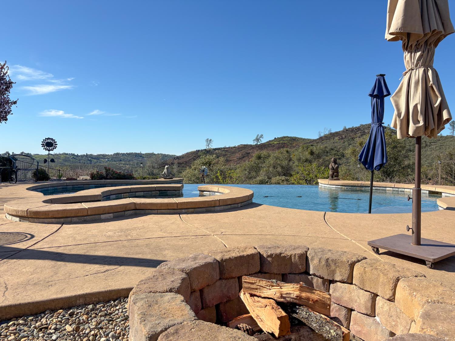 2920 Martel Creek Road Rescue, CA 95672 - Photo 50 of 69 a view of swimming pool with seating area and barbeque oven