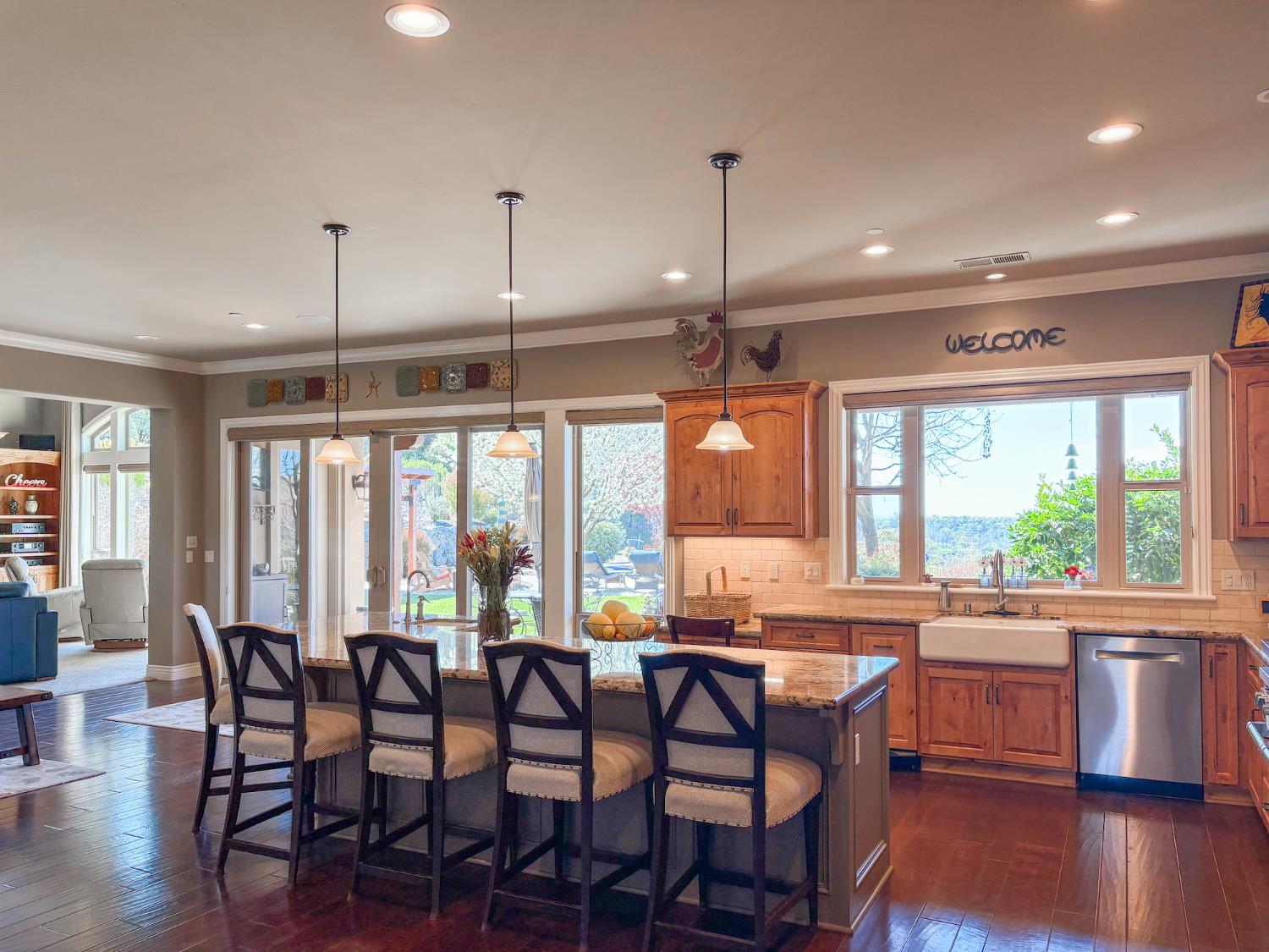 2920 Martel Creek Road Rescue, CA 95672 - Photo 6 of 69 a large kitchen with a table and chairs