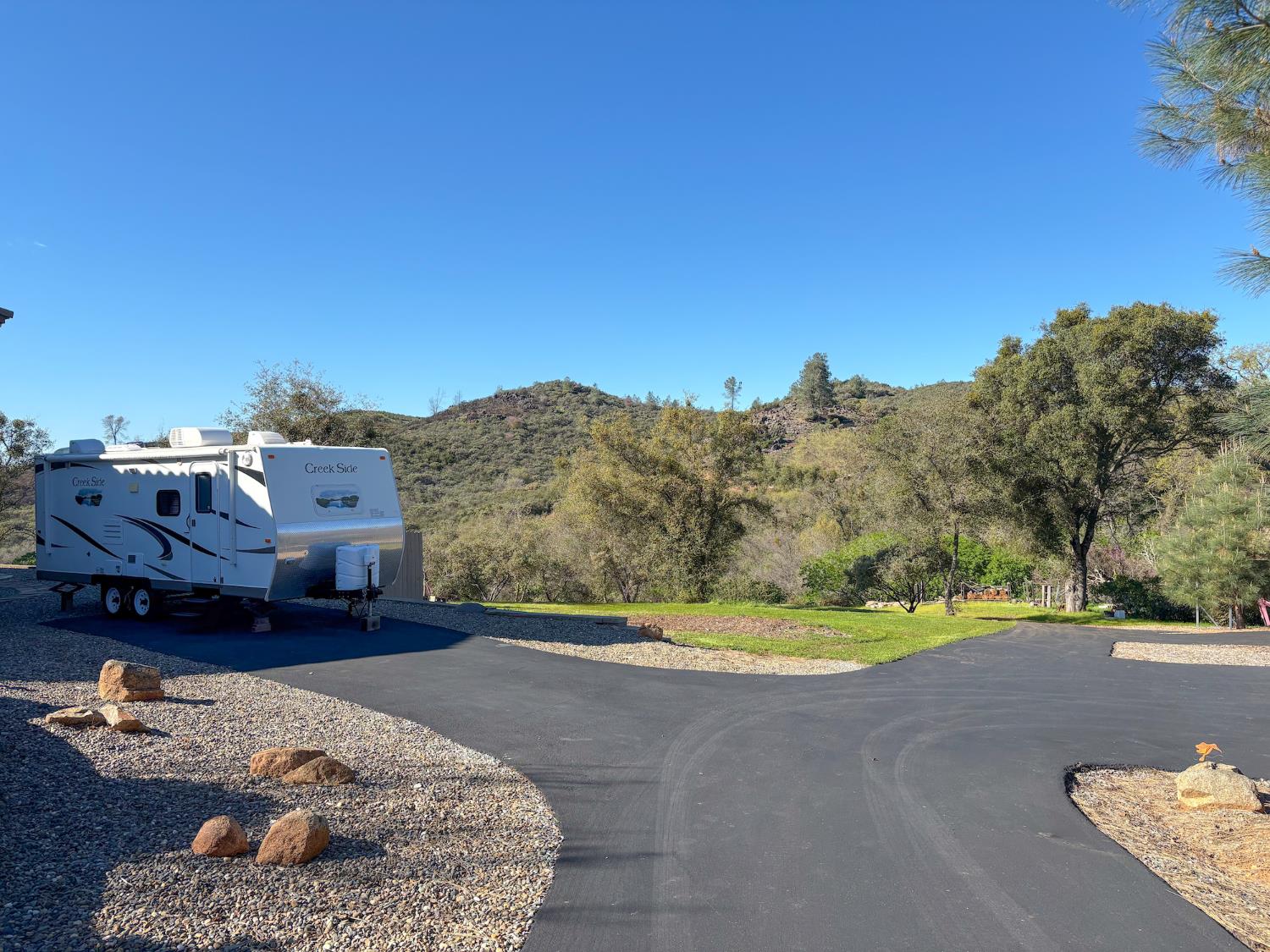 2920 Martel Creek Road Rescue, CA 95672 - Photo 63 of 69 a big yard with lots of tress in it