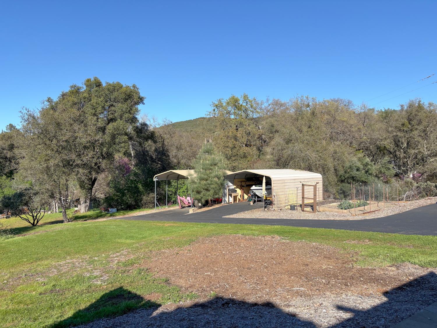 2920 Martel Creek Road Rescue, CA 95672 - Photo 66 of 69 a house view with a outdoor space