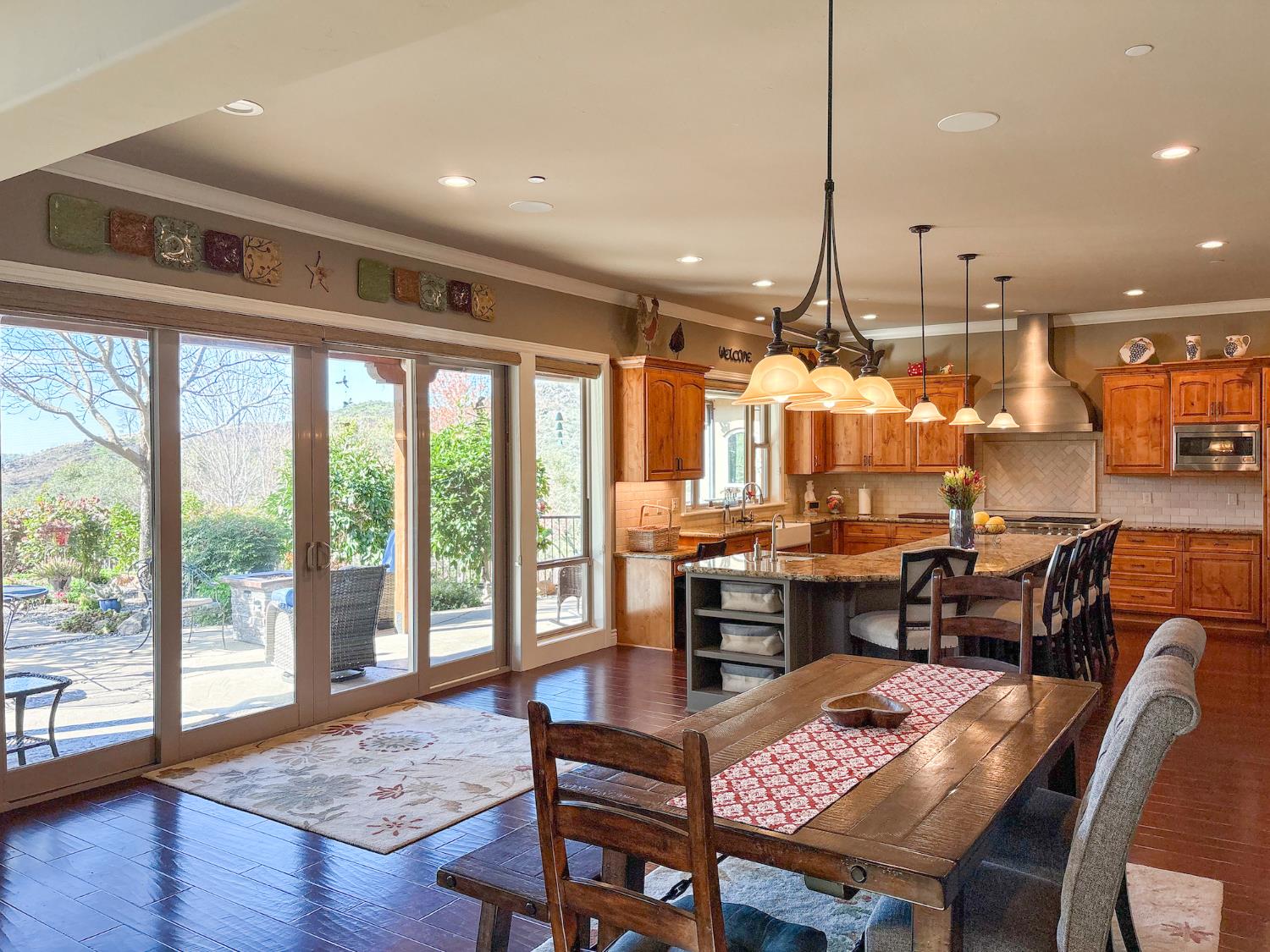 2920 Martel Creek Road Rescue, CA 95672 - Photo 9 of 69 a view of a dining room with furniture window and wooden floor