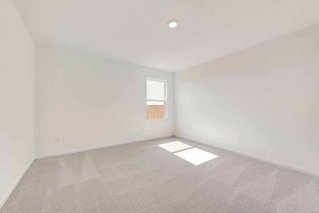 1271 Falcon Hts Drive Forney, TX 75126 - Photo 15 of 29 Spare room featuring carpet and baseboards