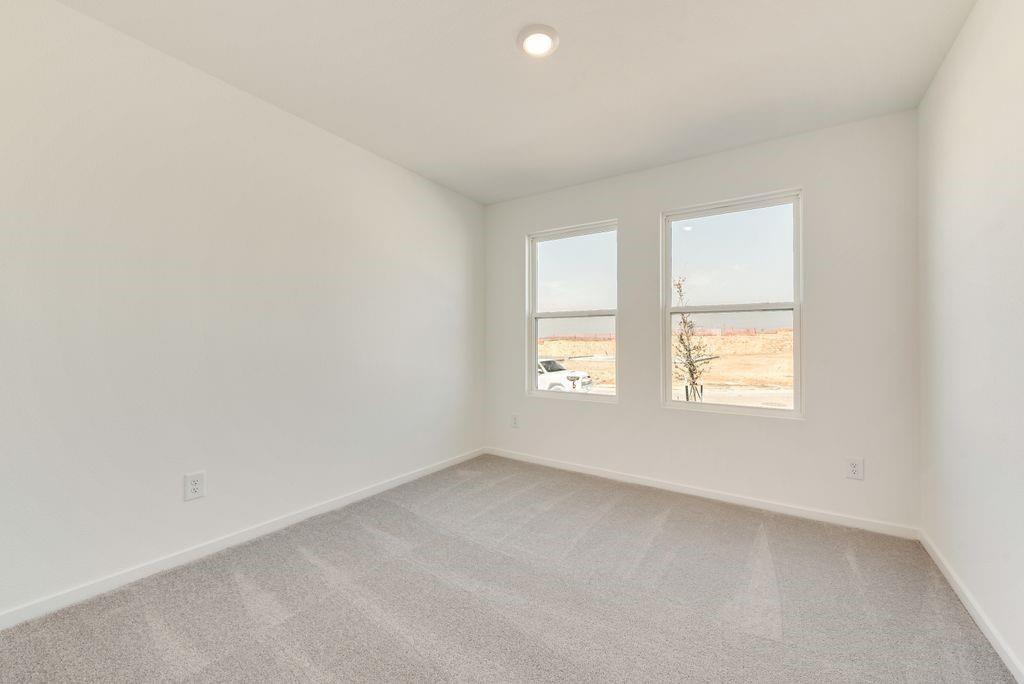 1271 Falcon Hts Drive Forney, TX 75126 - Photo 19 of 29 Empty room with light carpet