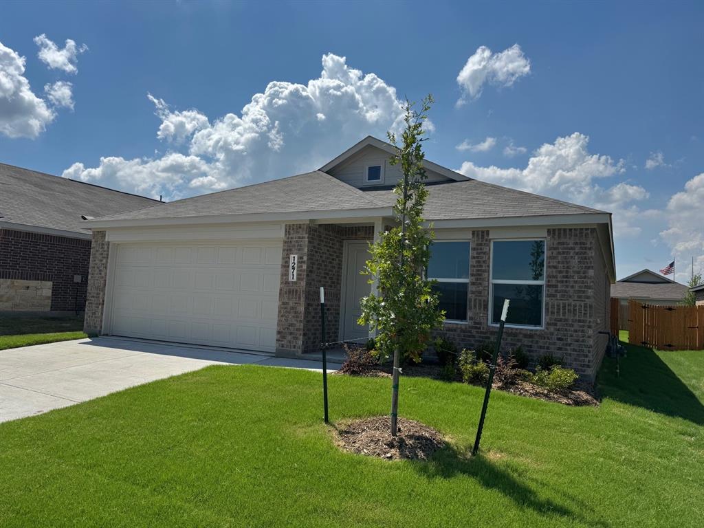 1271 Falcon Hts Drive Forney, TX 75126 - Photo 2 of 29 View of front of home featuring concrete driveway, brick siding, and a garage