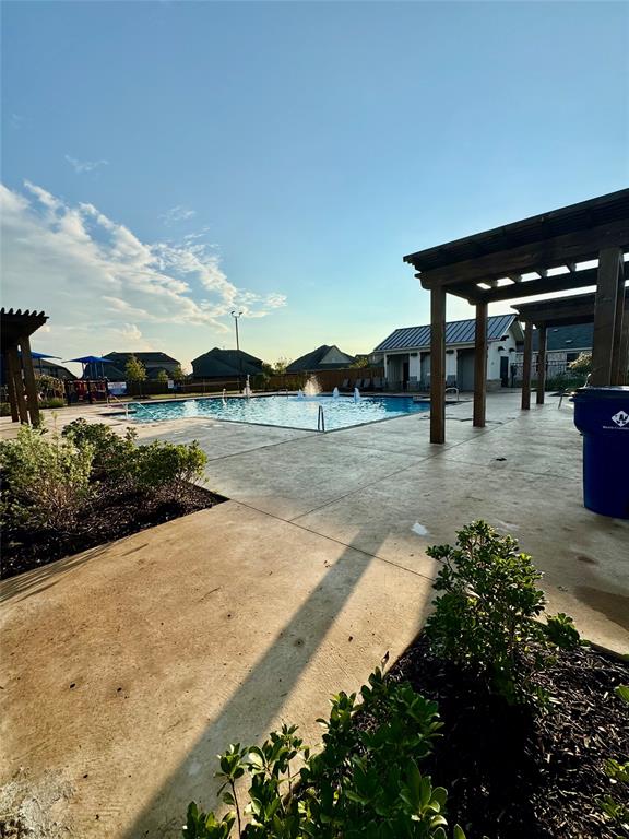 1271 Falcon Hts Drive Forney, TX 75126 - Photo 26 of 29 Community pool with a pergola and a patio area