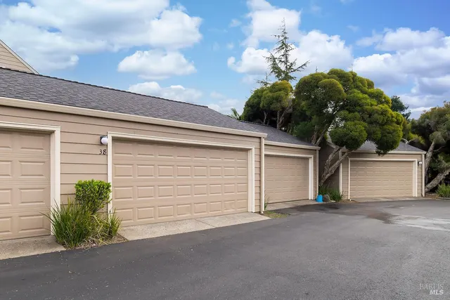 a garden view with a sitting space