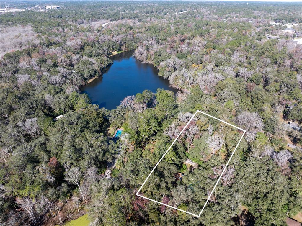 229 Southwest 43rd Terrace Gainesville, FL 32607 - Photo 43 of 57 Approximation of subject property lot lines & view of Clear Lake