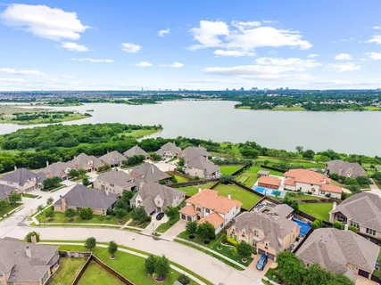 a view of lake and houses with outdoor space