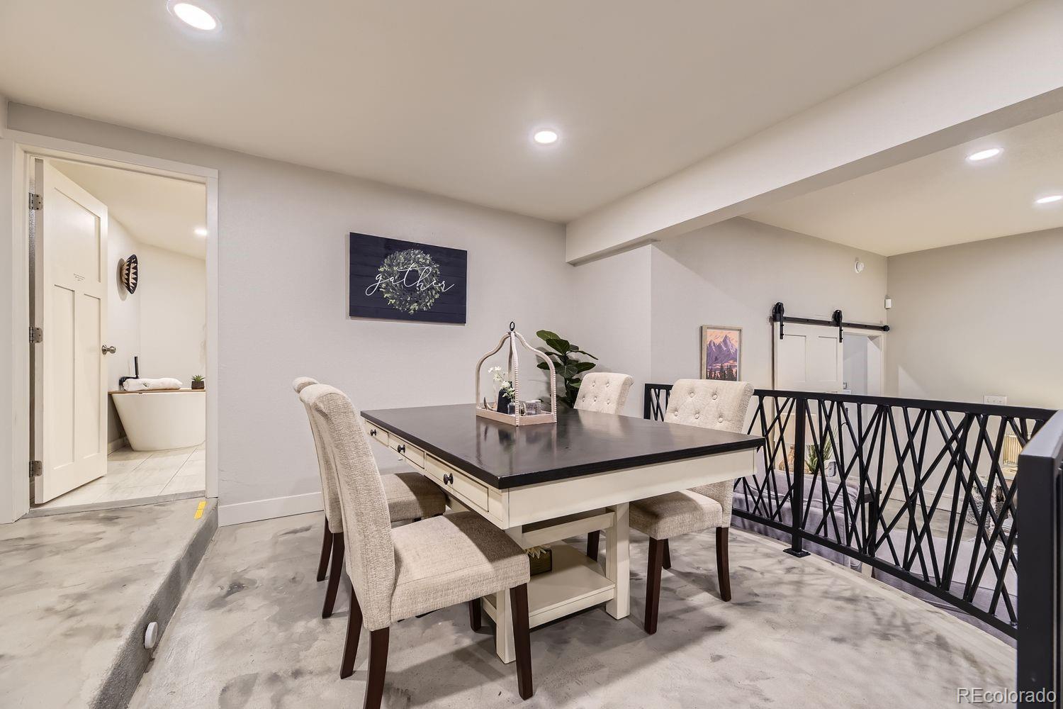 2132 North Nevada Avenue Colorado Springs, CO 80907 - Photo 11 of 26 a view of a dining room with furniture
