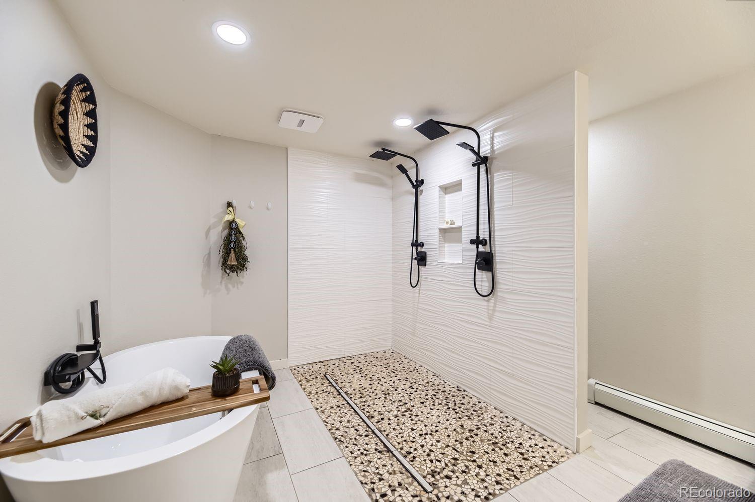 2132 North Nevada Avenue Colorado Springs, CO 80907 - Photo 18 of 26 a bathroom with a sink and a mirror