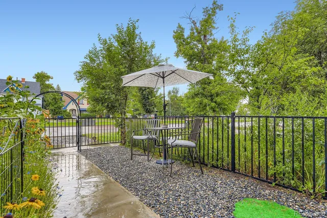 a view of a wrought iron fences in front of house