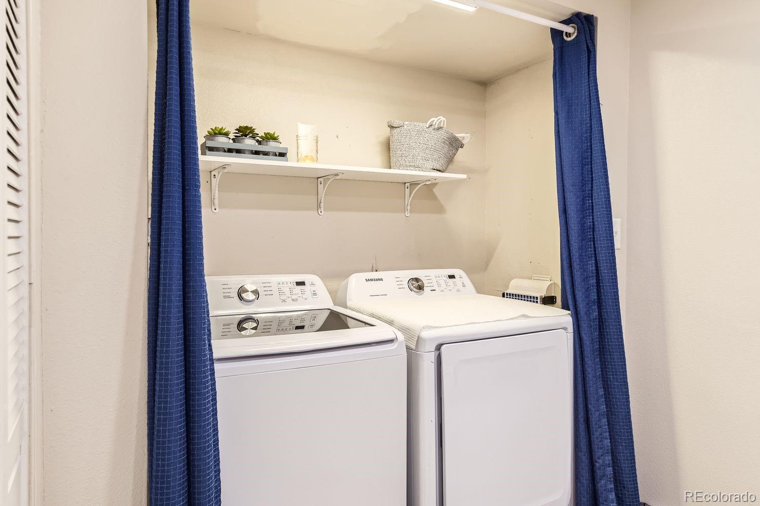 2132 North Nevada Avenue Colorado Springs, CO 80907 - Photo 23 of 26 a utility room with dryer and washer