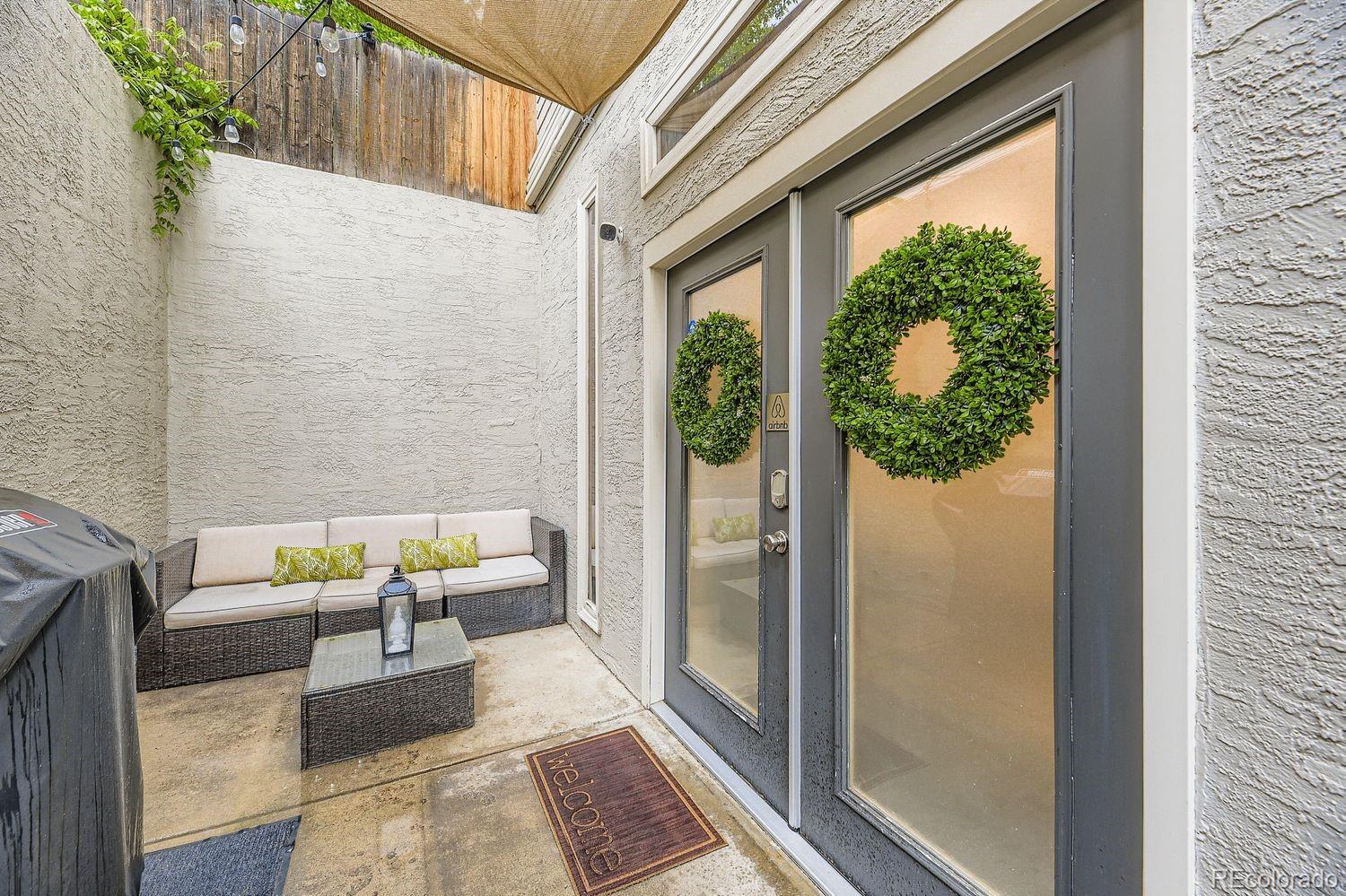 2132 North Nevada Avenue Colorado Springs, CO 80907 - Photo 4 of 26 a view of a balcony with furniture