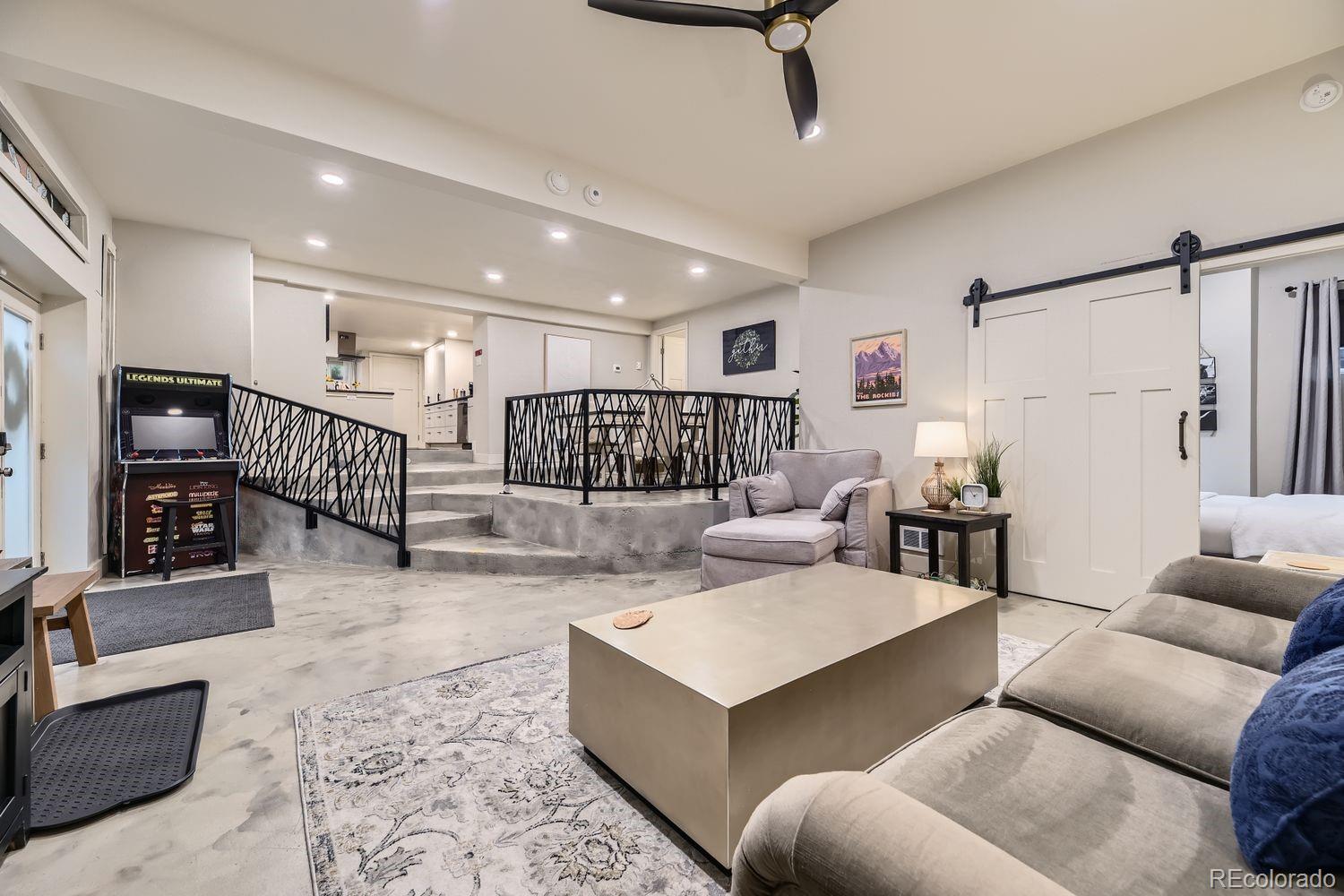 2132 North Nevada Avenue Colorado Springs, CO 80907 - Photo 8 of 26 a living room with furniture and a rug