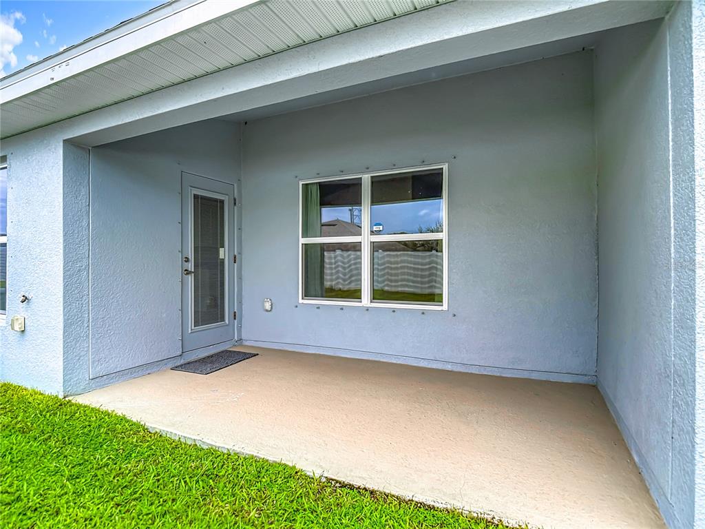 14917 Tropical Violet Way Wimauma, FL 33598 - Photo 54 of 77 a view of an empty room with a window