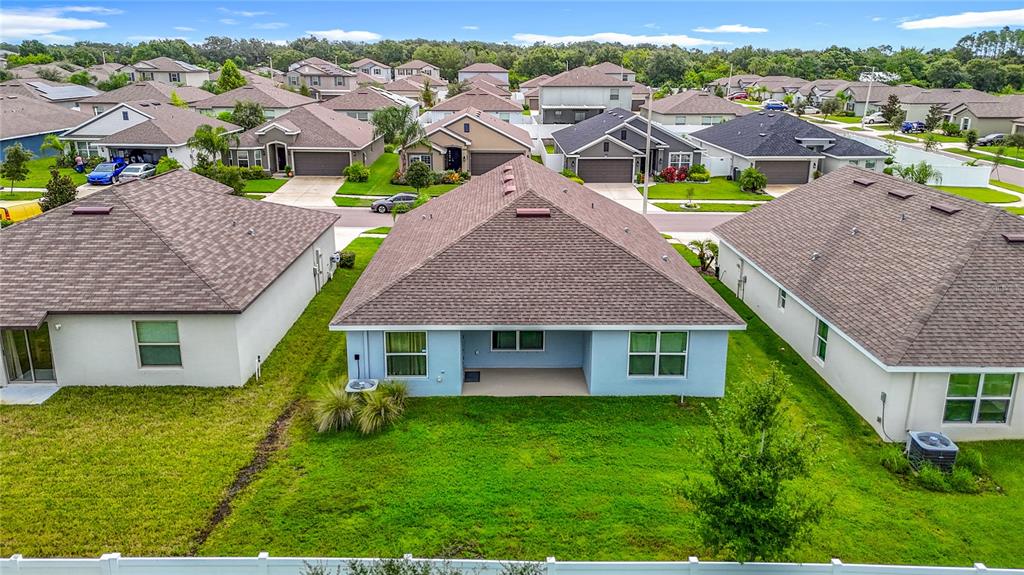 14917 Tropical Violet Way Wimauma, FL 33598 - Photo 59 of 77 a aerial view of a house with a yard