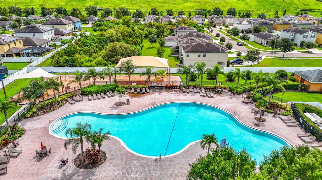 14917 Tropical Violet Way Wimauma, FL 33598 - Photo 64 of 77 an aerial view of a house having outdoor space