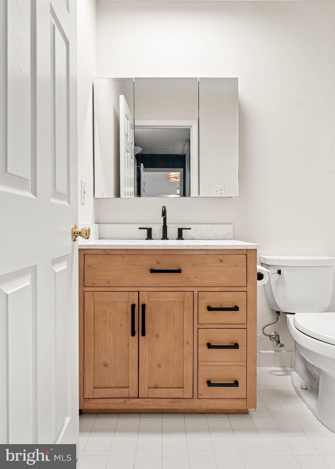 423 Old Forge Crossing, Unit 423 Devon, PA 19333 - Photo 15 of 24 Renovated Bathroom