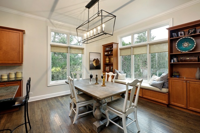 920 Bluff Street Glencoe, IL 60022 - Photo 11 of 29 a view of a dining room with furniture window and wooden floor