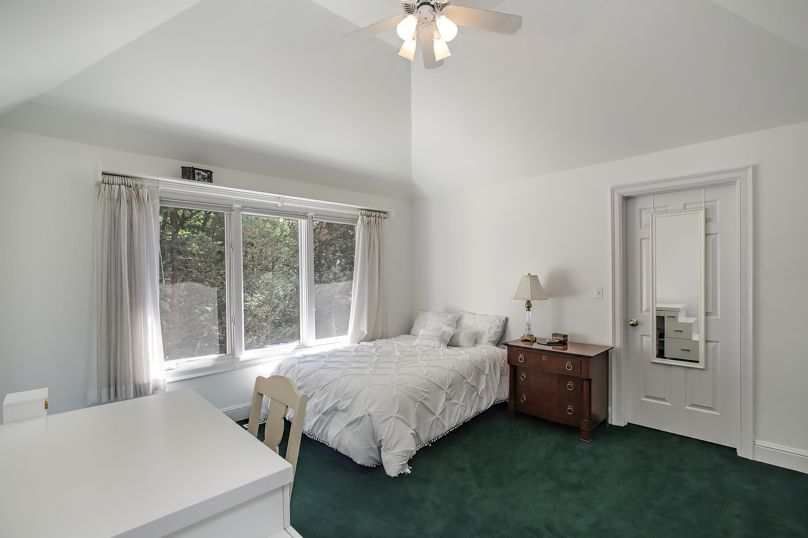 920 Bluff Street Glencoe, IL 60022 - Photo 18 of 29 a bedroom with a bed and a window