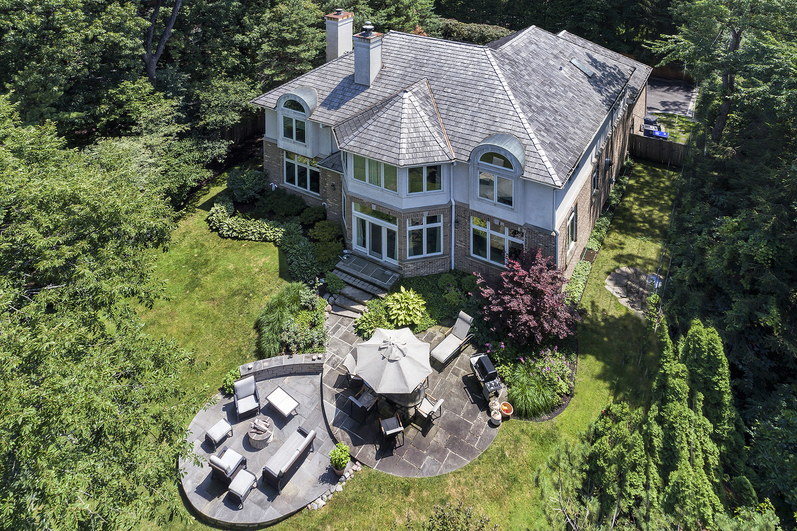 920 Bluff Street Glencoe, IL 60022 - Photo 2 of 29 an aerial view of a house with garden space and street view