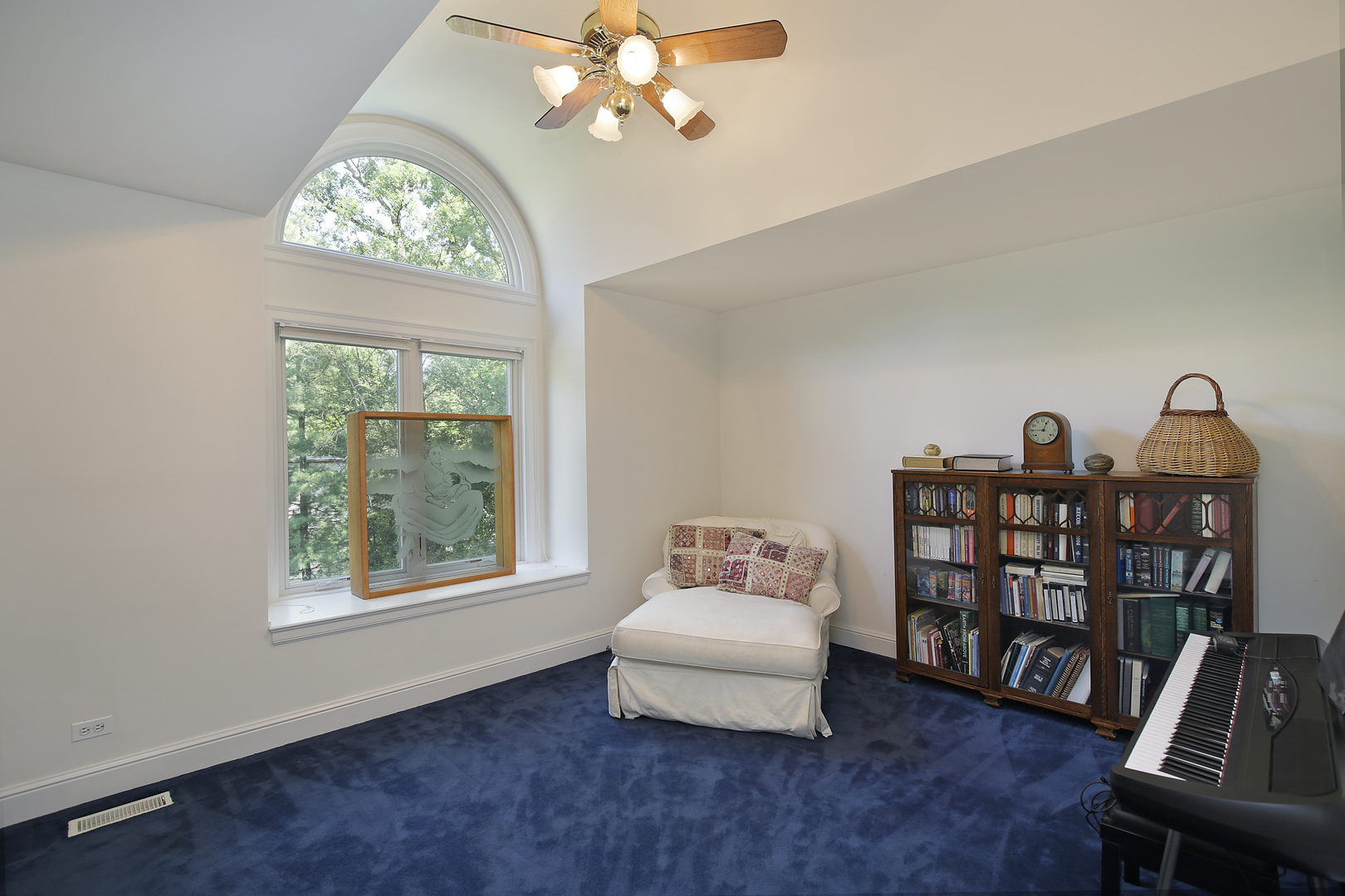 920 Bluff Street Glencoe, IL 60022 - Photo 21 of 29 a living room with furniture a rug and a window