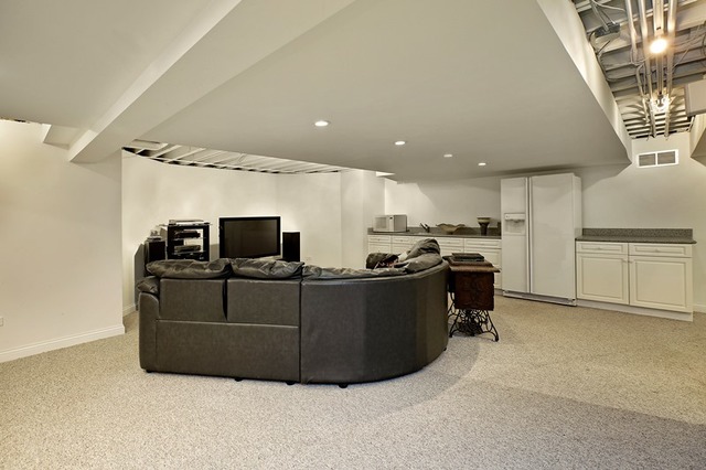920 Bluff Street Glencoe, IL 60022 - Photo 23 of 29 a living room with stainless steel appliances kitchen island granite countertop a sink a stove and a refrigerator