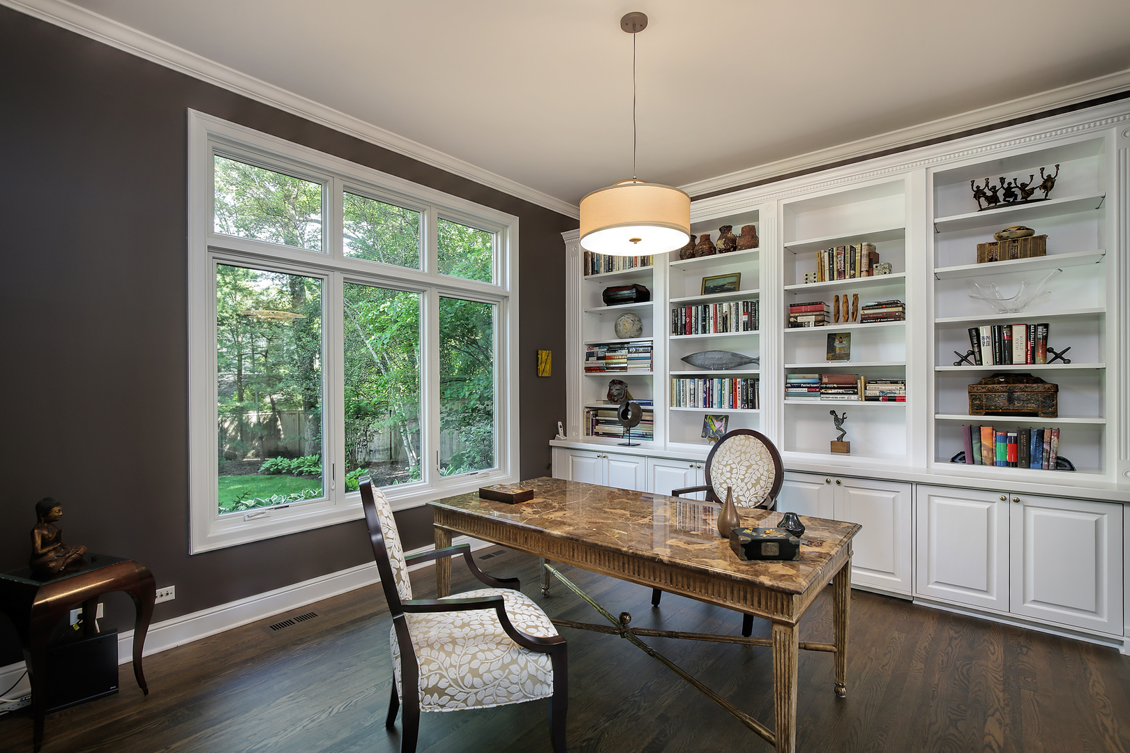 920 Bluff Street Glencoe, IL 60022 - Photo 7 of 29 a view of a workspace with furniture window and wooden floor