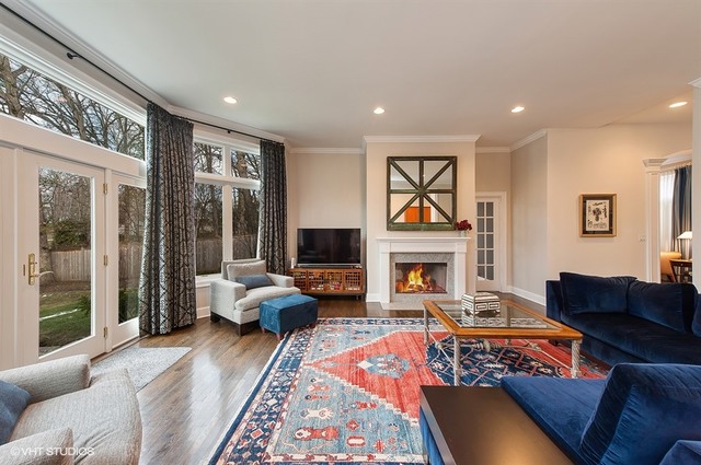 920 Bluff Street Glencoe, IL 60022 - Photo 8 of 29 a living room with furniture or couch and a fireplace
