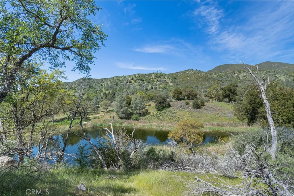 0 Av Ranch Lockwood, CA 93932 - Photo 13 of 26 a view of a lake with a mountain in the background