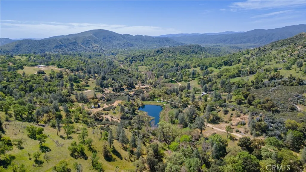0 Av Ranch Lockwood, CA 93932 - Photo 18 of 26 a view of a lush green field with a mountain in the background