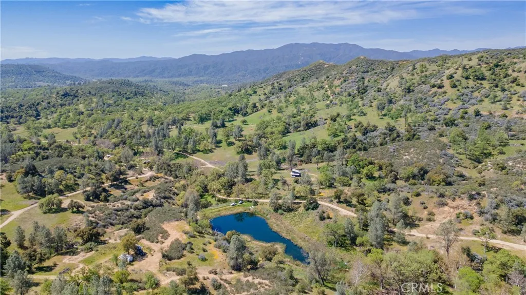 0 Av Ranch Lockwood, CA 93932 - Photo 19 of 26 a view of a lush green hillside and a building