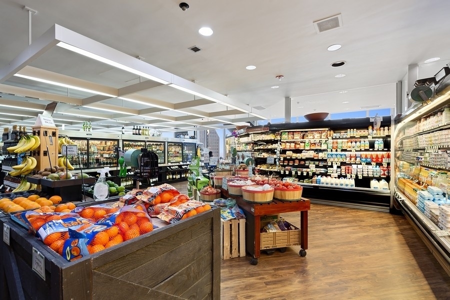 175 East Delaware Place, Unit 7204 Chicago, IL 60611 - Photo 28 of 30 a room with lots of different colored cloths