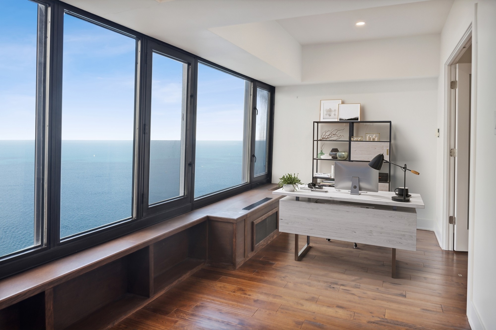 175 East Delaware Place, Unit 7204 Chicago, IL 60611 - Photo 9 of 30 a living room with granite countertop furniture and wooden floor