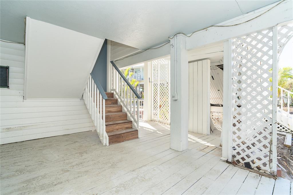 20 Palm Drive Placida, FL 33946 - Photo 13 of 46 a view of entryway with stairs