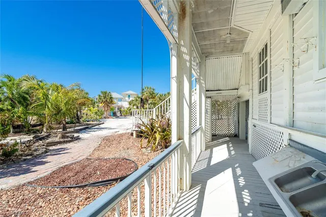 a view of a balcony with chair