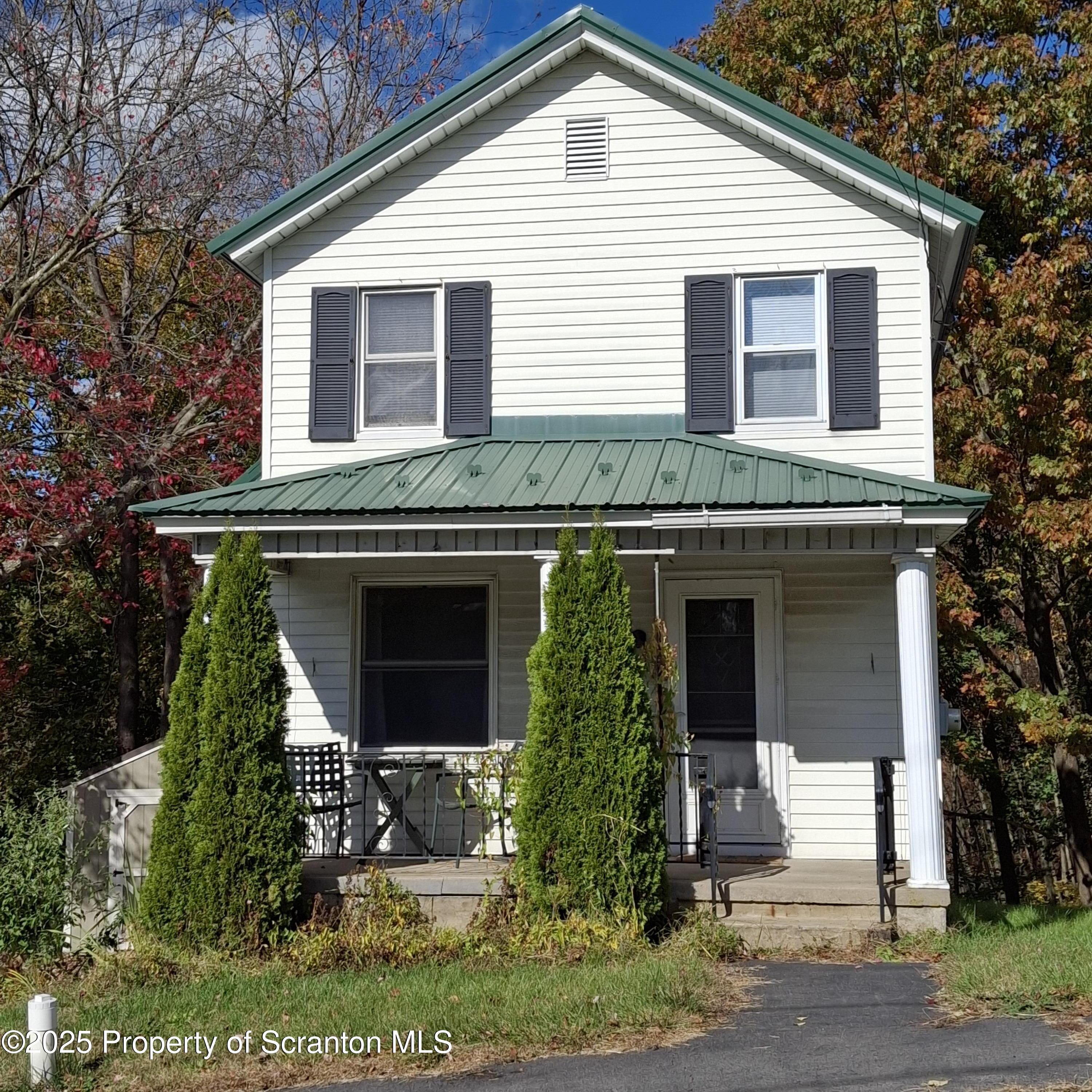 430 Salem Road Archbald, PA 18403 - Photo 1 of 19 a front view of a house with a garden