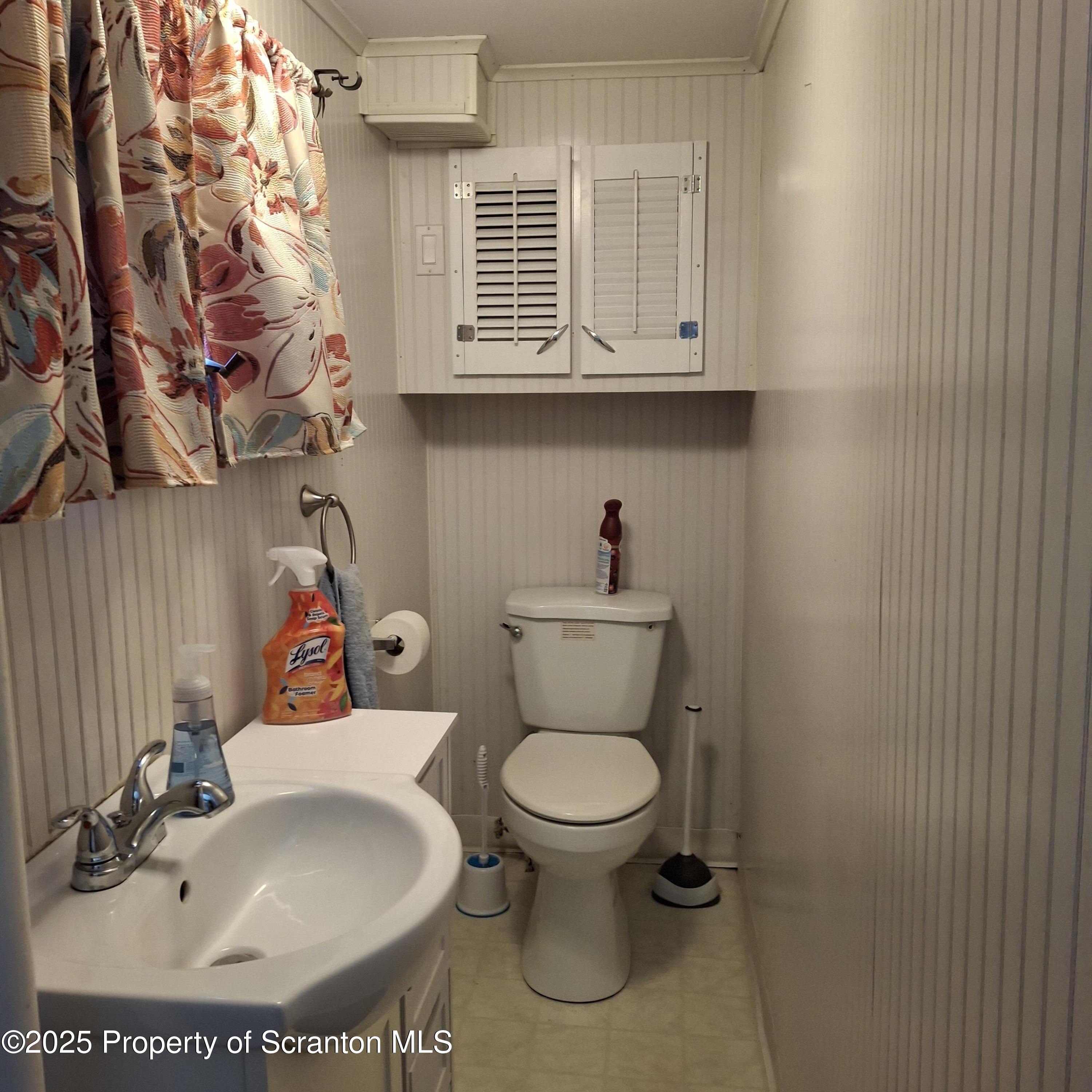 430 Salem Road Archbald, PA 18403 - Photo 12 of 19 a bathroom with a toilet sink and mirror