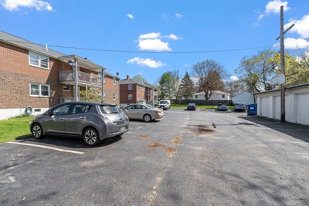 10 Vecchia Street, Unit C Webster, MA 01570 - Photo 24 of 29 a car parked in front of a building