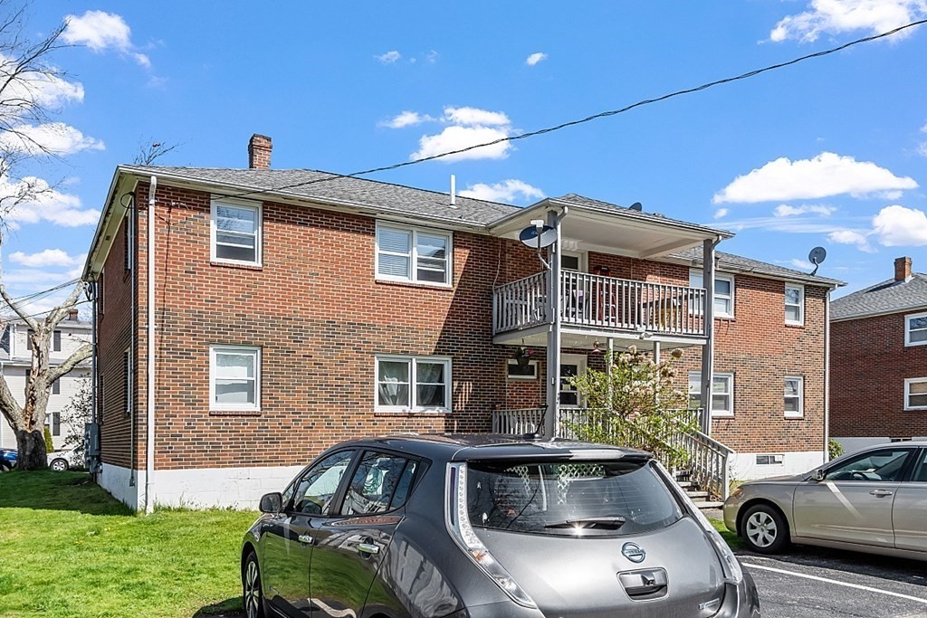 10 Vecchia Street, Unit C Webster, MA 01570 - Photo 25 of 29 a front view of a house with parking space