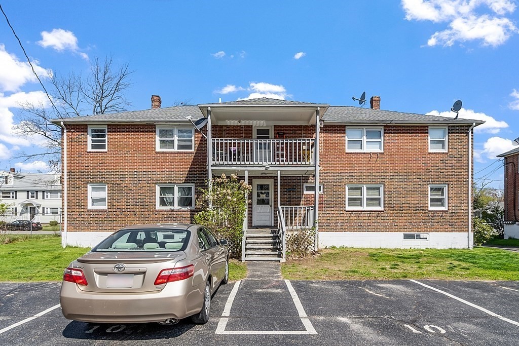 10 Vecchia Street, Unit C Webster, MA 01570 - Photo 26 of 29 a front view of a house with garden