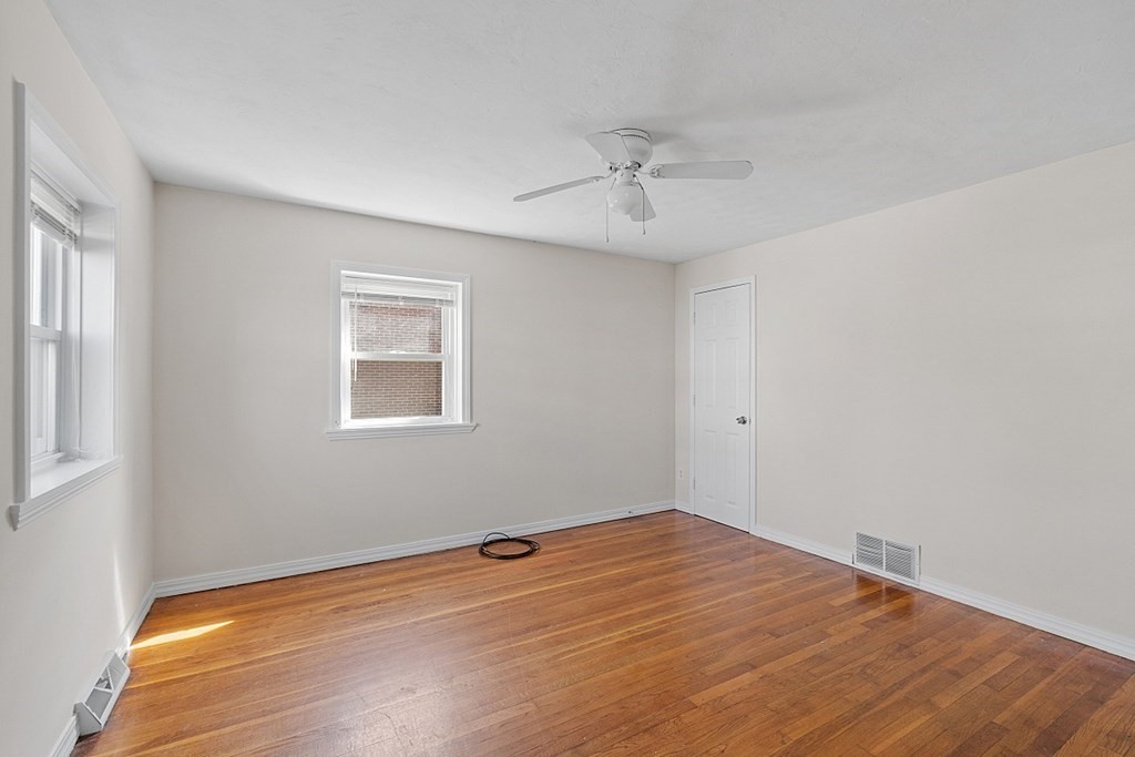 10 Vecchia Street, Unit C Webster, MA 01570 - Photo 10 of 29 a view of an empty room with a window