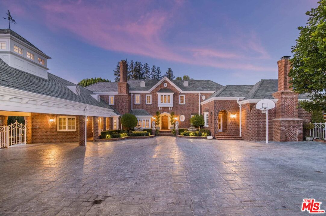 25045 Jim Bridger Road Hidden Hills, CA 91302 - Photo 11 of 52 a view of a building with a street