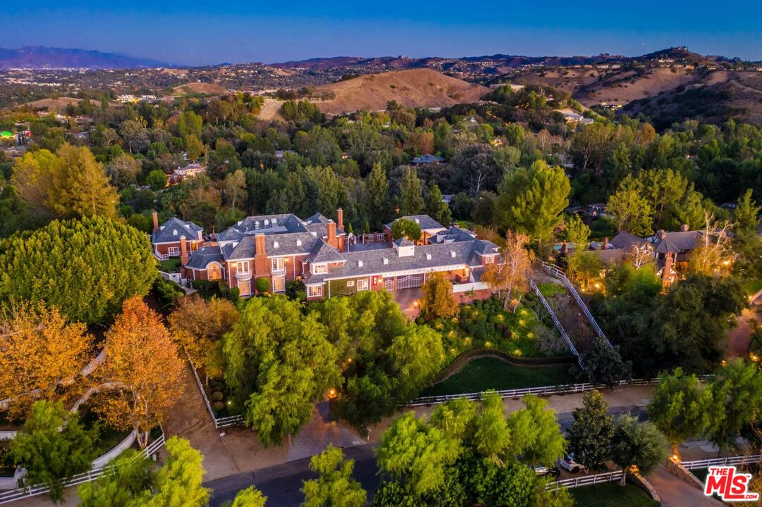 25045 Jim Bridger Road Hidden Hills, CA 91302 - Photo 12 of 52 an aerial view of a house with a yard